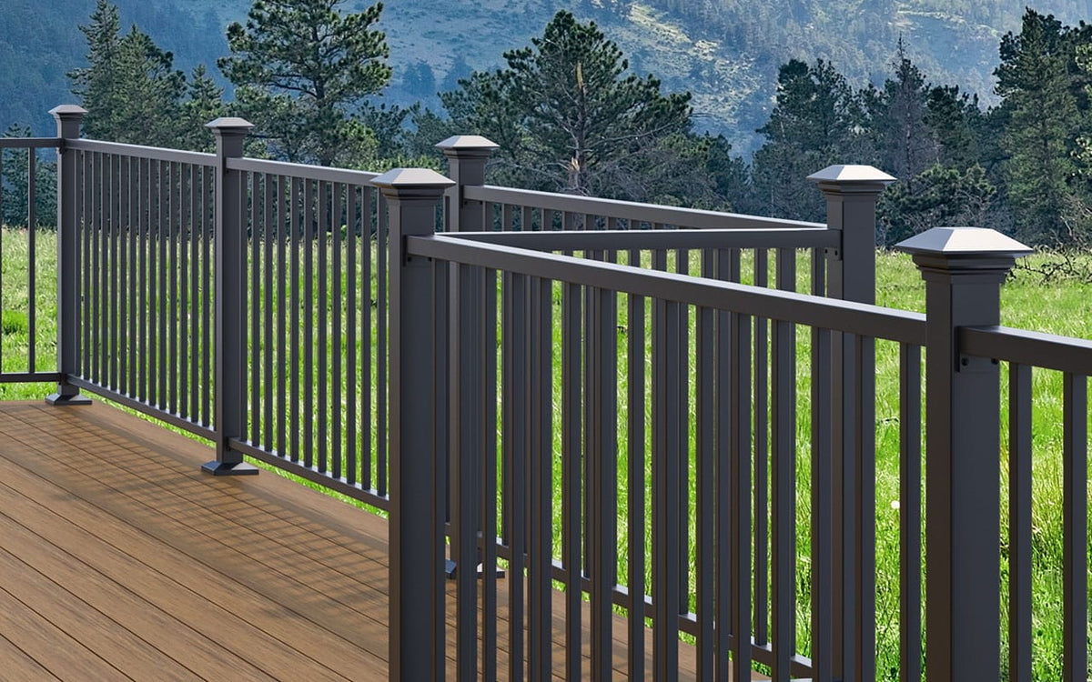 Deckorators ALX Contemporary railing in textured black with lighted post caps on a deck