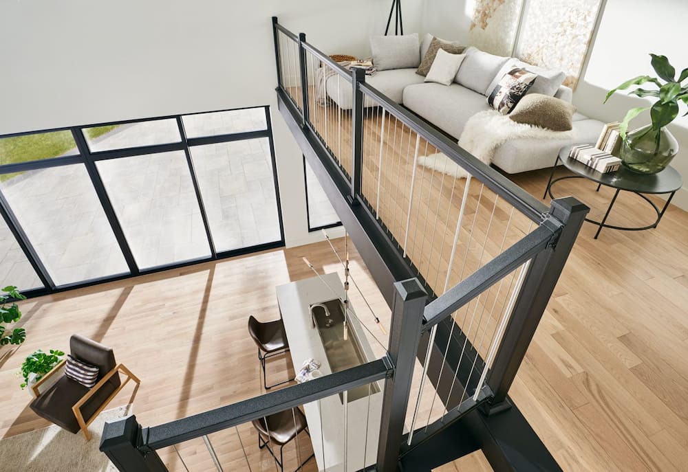 Key-Link Vertical Cable Railing is used on an interior balcony