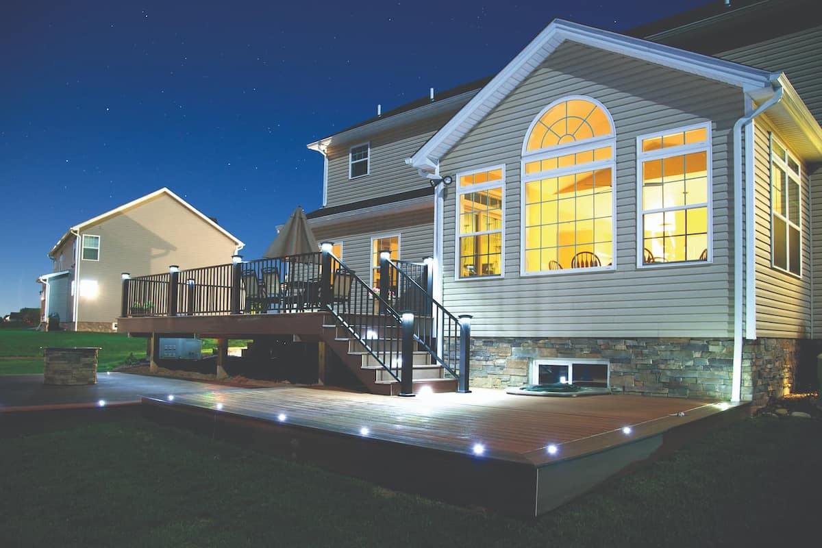 LMT Lighting is featured on a deck with railing