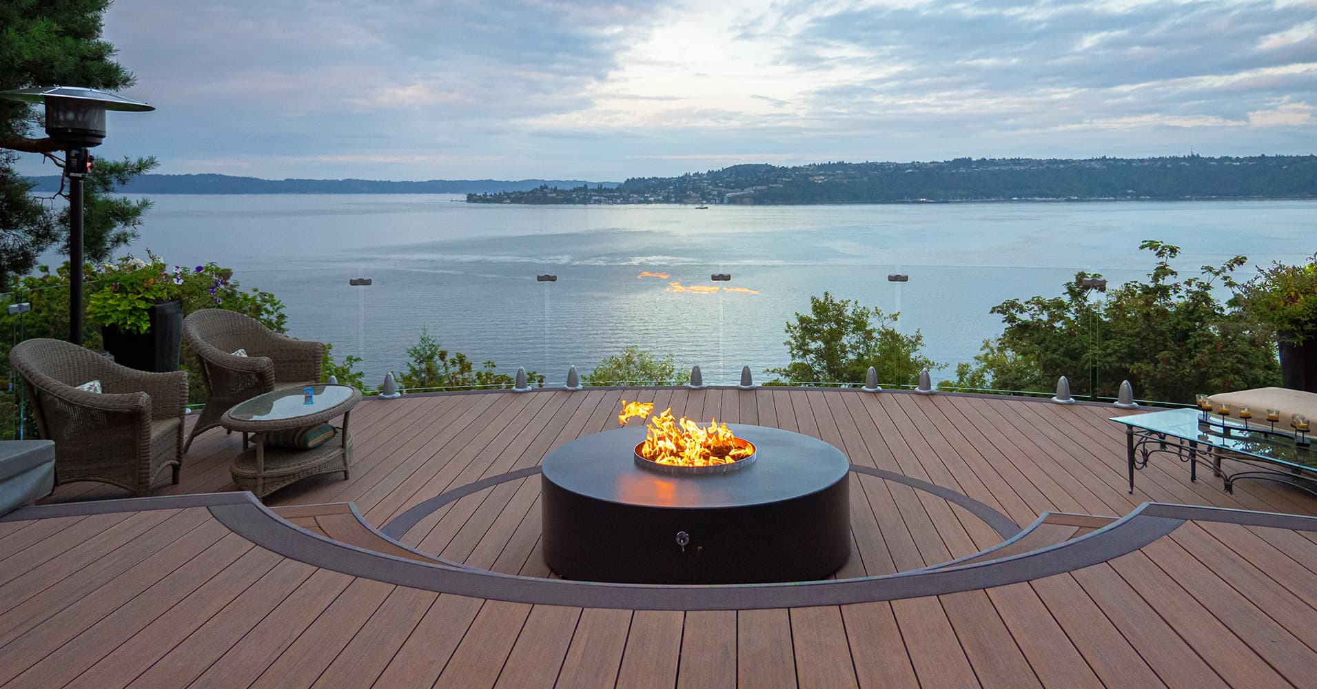 Regal Crystal Rail Framless Glass Railing on a deck overlooking a lake