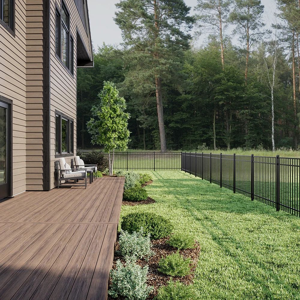 Deckorators aluminum fence in a residential backyard