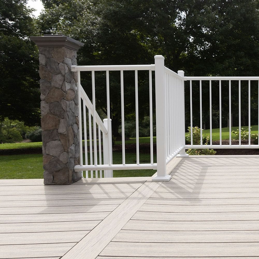 Deckorators stone postcovers flanking deck steps